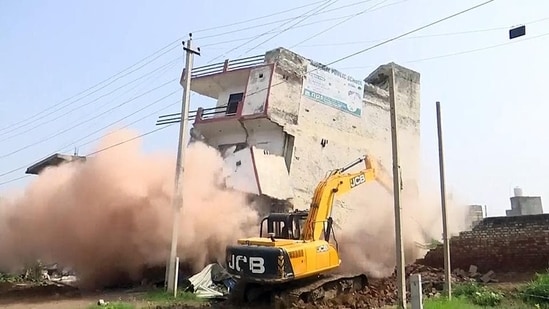 An illegal hotel-cum-restaurant being demolished from where stones were allegedly pelted during the recent violence that erupted between groups in Nuh on Sunday (ANI FILE)